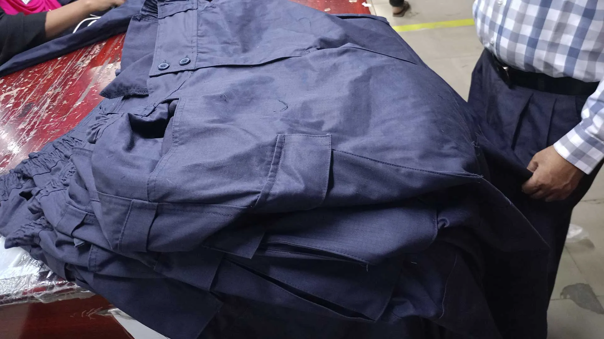 Workwear production in progress at RYZEAL SOURCING, a clothing manufacturer and apparel sourcing company in Bangladesh, ensuring durable and high-quality garments for global buyers.